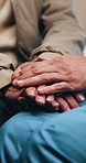 Support, nurse and old person with holding hands, comfort and empathy in assisted living. Compassion, caregiver and senior man with understanding, kindness and patient connection in retirement care.