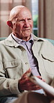 Counseling, psychology and talking with senior man in office for help, trauma support or rehabilitation. Therapy session, psychiatry patient or elderly person with anxiety, mental health or clipboard