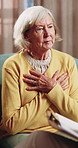 Therapy, psychology and talking with senior woman in office for help, grief support and rehabilitation. Counseling session, psychiatry patient or elderly person with loss, mental health or notes
