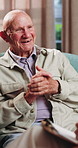 Psychology, senior and talking with happy man in therapy office for help, healing and rehabilitation. Counseling, psychiatrist or old person with smile, mental health recovery and clipboard notes