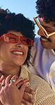 Smile, hug and couple by beach on holiday, getaway or weekend trip for bonding in marriage together. Happy, sunglasses and man embracing woman with love, trust and care by ocean on summer vacation.