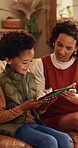 Mom, son and tablet on sofa for elearning, bonding and educational app in home. African family, woman and child with tech for streaming subscription, growth and online development for boy in lounge