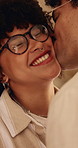 Love, smile or couple with cheek kiss, partner connection or bonding together in living room. Support, tender or people in house with affection, romantic moment or commitment in happy relationship.