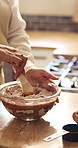 Baking, hands and mixing ingredients in home for cake batter, recipe process and culinary skills. Baker, person or flour mixture in kitchen for homemade dessert, muffin snack or breakfast preparation