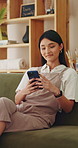 Relax, woman and smile with phone in home for reading online blog, status update or weekend break. Happy, girl and mobile search in apartment for app download, streaming videos or social media scroll