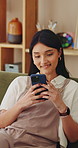 Relax, woman and smile with phone on sofa for reading online blog, status update or weekend break. Happy, person and mobile search in house for app download, streaming videos or social media scroll