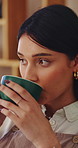 Thinking, coffee and woman in home for calm, relax or peaceful morning with planning day. Ideas, reflection and person drinking warm beverage for nostalgia, memory or remember in living room at house