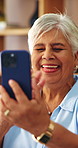 Happy, old woman and wave on video call with phone for social connection, contact or blow kiss. Smile, senior person and hello with mobile in home for virtual conversation, relax and digital literacy
