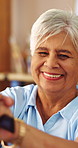 Face, smile and old woman in home with cane, laughing and unwind with positive attitude on weekend. Portrait, walking stick and happy person with disability, retirement and funny with wellness