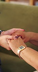 Hands, caregiver and comfort old person on sofa for medical news, healing reassurance or homecare. Healthcare, carer or encourage senior patient in assisted living for chronic diagnosis, hope or home