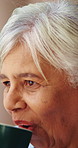 Senior, coffee and happy woman in retirement home for morning beverage, nostalgia or past moment. Elderly, female person or drinking with smile, cup or mug for reflection, memory or vision in house