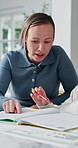 Mother, child and teaching with book in home school for development, talking or study together. Girl, parent and help for education, learning knowledge and tutoring with homework project at house