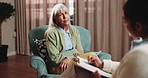 Clipboard, stress and psychologist with senior woman in office for coping mechanisms on trauma. Talking, help and therapist with elderly person for mental health evaluation for support in clinic.