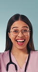 Happy, woman and face of nurse in studio with solution, decision or problem solving for medical diagnosis. Thinking, portrait and healthcare worker on blue background with solution, idea or choice.