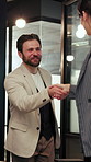 Businessman, arrival and handshake with team in meeting, talk and planning for case with legal info. Attorney, collaboration and happy people with paperwork, shaking hands and discussion in law firm