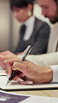Writing, hands and business people in meeting for schedule reminder, planning or tasks in office. Employees, colleagues or woman taking notes in diary or notebook for project ideas or work agenda