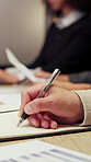 Writing, hands and business people in office desk for schedule reminder, planning or tasks. Employees, colleagues or person taking notes in diary or notebook for project ideas or agenda in workplace