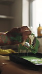 Hands, people and paint brush for home renovation, transformation and interior design with color. Help, house remodeling and together for maintenance, painting and property improvement with support