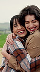 Happy, women and vacation with hug in nature for outdoor adventure, travel or trip together. Female people, embrace or smile with love or care in countryside for holiday getaway, weekend or bonding