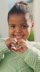 Heart hands, smile and face of black child outdoor for new home success, weekend break and growth. Property development, happiness and love emoji with african girl in backyard of house for security