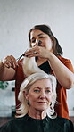 Salon, client and hairdresser with scissors, haircut and hair removal with comb and grooming routine. Small business, makeover and trim process for mature woman, haircare and stylist with equipment