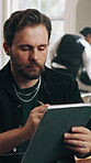 Agenda, small business and tablet with man in barbershop for management, planning or research. App, online booking and writing with mature person at hairdresser for report, review or schedule