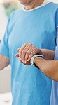 Nurse, walking and holding hands with old person for help, balance or rehabilitation support in clinic. Patient, medical worker or assistance with people in retirement, healthcare recovery or healing