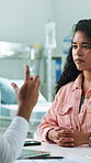 Healthcare, doctor or consulting woman in clinic for medical advice, treatment options or update. Checkup, professional and talking to patient for health feedback, diagnosis or explain follow up care