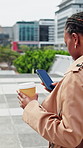 Woman, walking and phone with coffee in city for communication, social media or outdoor network. Female person, travel or commute with mobile smartphone or beverage for online chatting or texting app