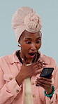 Surprise, alert and black woman with phone for winning or notification on a studio background. Excited, happy or female person with shock on smartphone app for good news, promotion or bonus success