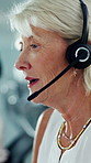 Agent, woman and consulting with headset in call center for loan assistance, online support or CRM. Advisor, mature person and talking on mic for insurance claim, policy update and customer service