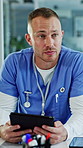 Nurse, man and meeting in hospital with tablet, online research and discussion for health insurance. Person, conversation and tech in clinic for internet, explain medical aid policy and planning.