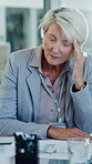 Mature, woman and doctor with stress in boardroom for overwhelmed pressure or strain in busy office. Female person, health worker or headache with migraine for overworked schedule, tasks or anxiety