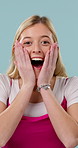 Face, woman and happy in studio with surprise, promotion and announcement for giveaway prize winner. Excited, female person and shock with good news, wow reaction and win reward on blue background.