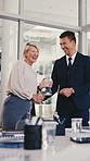 Shaking hands, trophy and business people in office with congratulations, well done or finance achievement. Laugh, thank you and financial manager with advisor for handshake with investment award.