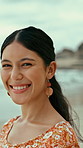 Face, woman and happy at beach for travel, adventure and calm morning on summer holiday. Portrait, female person and smile at sea for fresh air, positive attitude and tropical vacation for summertime