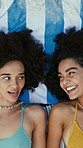 Towel, friends and above of women at beach for bonding, hangout and relax for summer holiday. Travel, happy and people for talking, conversation and laugh for vacation, weekend and break outdoor