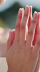 Yoga, woman and prayer hands outdoor with meditation, spirituality and holistic health for wellness. Zen, female person and mindfulness exercise with mudra, namaste pose and fitness for self care.