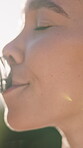 Break, drinking water and fitness with woman outdoor for cardio, recovery or training in summer. Exercise, health and wellness with happy runner in nature for activity, commitment or hydration