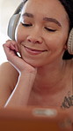 Woman, relax and tablet with headphones for yoga, fitness app notification and smile for wellness. Happy person, completed exercise and rest in home with audio tech, typing and finish video tutorial.