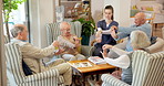 Caregiver, playing and old people in home with boardgame, strategy and stretching for muscle game. Nurse, mobility or senior group at retirement house with activity, stimulation or social interaction