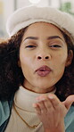 Blowing kiss, video call and face of woman in home for social media, influencer and flirt gesture. Online dating profile post, content creation and smile with person in apartment for vlog and update