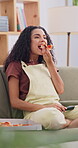 Relax, watching tv and pizza with woman on sofa for Italian takeaway, streaming and lunch. Film, happiness and movie with person and remote in living room in house for series, show and fast food