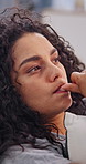 Mental health, thinking or woman in home with biting nails, bad habit or nervous tension in living room. Anxiety, stimming or person with depression, compulsive behavior or coping mechanism in lounge