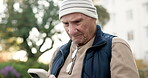 Typing, phone and reading with old man in nature for communication, retirement and contact. Connection, online pensioner update and text message with senior person and mobile outdoor for news