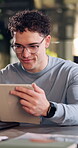 Reading, tablet and glasses with business man in office for search, public relation statement or editor. Online review, media report and project with employee and tech in agency for creative campaign
