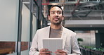 Tablet, thinking and walking with corporate man in office corridor for financial research. App, finance and review with happy employee in workplace hallway for digital agenda or investment report