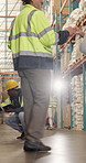 Hands, man and fist bump at warehouse for greeting, inspection and stock check for shipping. Team, hello and clipboard at depot with respect, inventory checklist and quality control for distribution