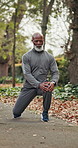 Fitness, old man or stretching legs outdoor for health, exercise preparation or streaming music. Warm up, black person or start workout on road, wellness or earphones with audio for active retirement