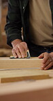 Hands, sandpaper and man with wood for carpenter job, woodwork manufacturing and warehouse. Person, productivity and process for smooth texture in workshop with custom or handmade timber furniture